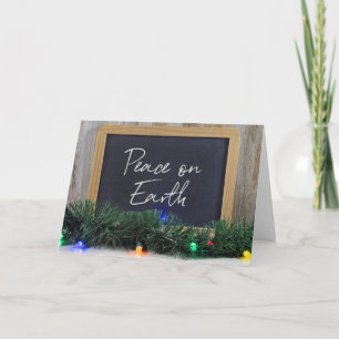 Cartes Pour Fêtes Annuelles Panneau Peace On Earth sur tableau noir