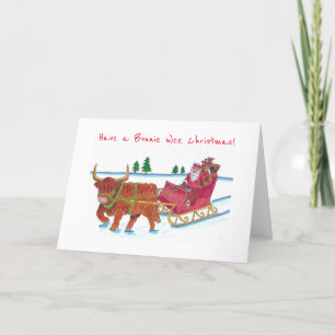 Cartes Pour Fêtes Annuelles Père Noël écossaise avec la vache Highland en traî