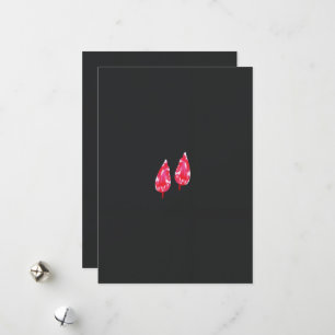 Cartes Pour Fêtes Annuelles une paire de feuilles rouges sur un arrière - plan
