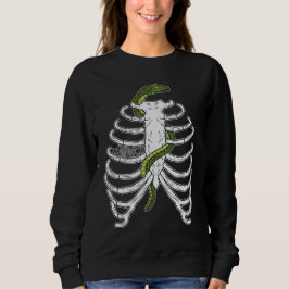 Cartoon aus menschlichem Rippenkäfig mit grünem Sc Sweatshirt