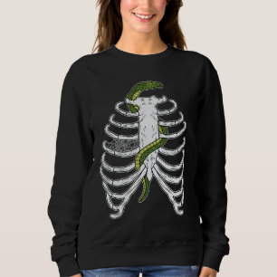 Cartoon aus menschlichem Rippenkäfig mit grünem Sc Sweatshirt