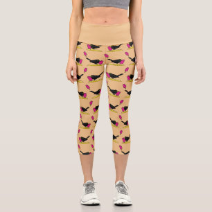 Cartoon Blackbird isst ein Eiscrememuster Capri Leggings