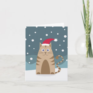 Cartoon Katze mit Weihnachtsmannmütze im Schnee Karte