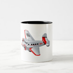 Cartoon-Retroflugzeug Zweifarbige Tasse