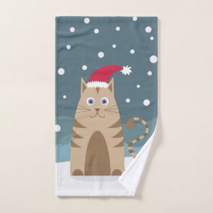 Cartoon-Weihnachtskatze mit Weihnachtsmannmütze im Handtuch