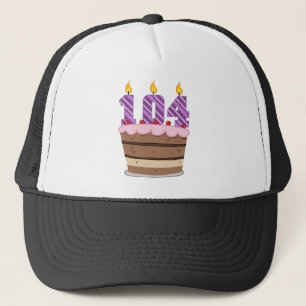 Casquette 104 ans sur le gâteau d'anniversaire
