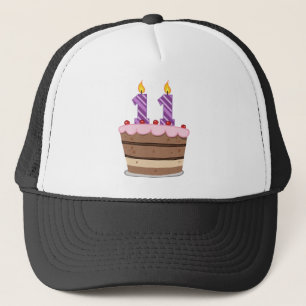 Casquette 11 ans sur le gâteau d'anniversaire