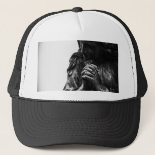 Casquette Ange déchu dans la prière