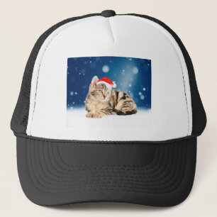 Casquette Chat mignon portant chapeau de Noël rouge neige