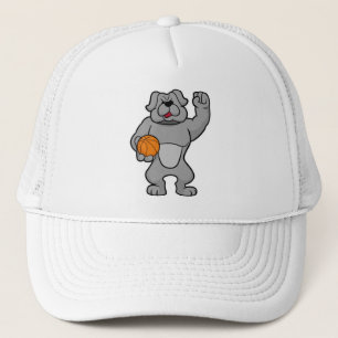 Casquette Chien comme joueur de basket-ball avec basket-ball