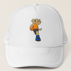 Casquette Chien comme joueur de basket-ball avec basket-ball