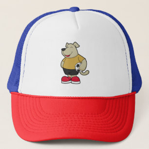 Casquette Chien comme joueur de football avec balle de footb