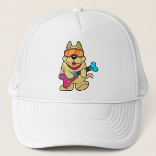 Casquette Chien comme musicien avec guitare