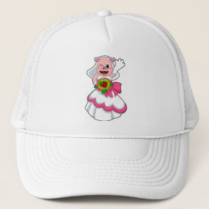 Casquette Cochon avec robe de mariée et bouquet de fleurs