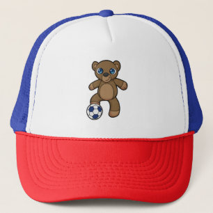 Casquette Ours comme joueur de football avec balle de footba
