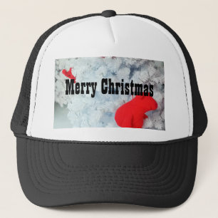 Casquette Ours en peluche rouge dans l'arbre de Noël