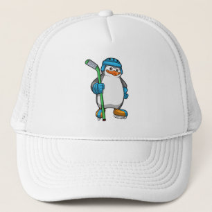 Casquette Pingouin au hockey sur glace avec bâton de hockey 