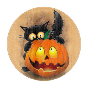 Cat Fun Halloween Charakter beißt einen Kürbis Schneidebrett