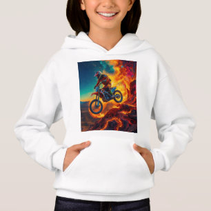 Cavalier de motocross échappant aux flammes