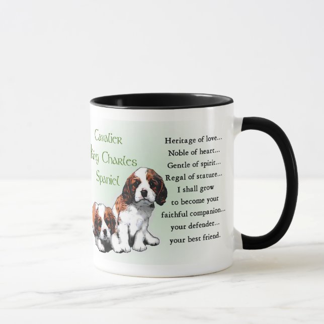 Cavalier King Charles Spaniel gibt Tasse (Rechts)