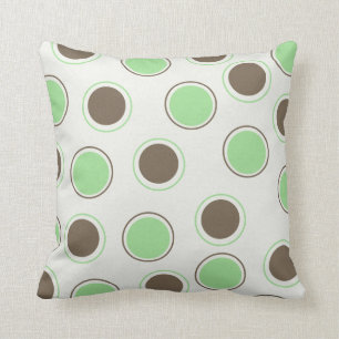 Cercles de chocolat et de menthe sur le coussin