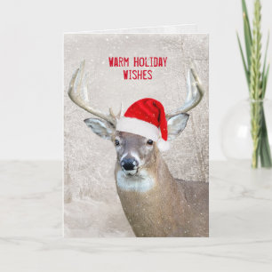 Cerf de Noël avec carte de vacances de Santa Hat