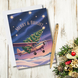 Cessna-Flugzeug trägt Weihnachtsbaum-Foto Lustig Feiertagskarte
