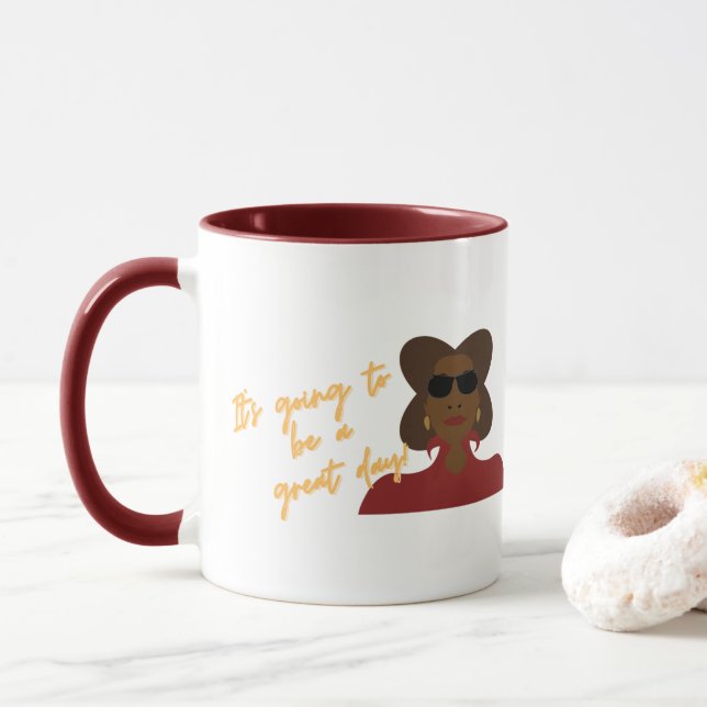 C'est un Goto to to be Great Day Mug (Avec donut)