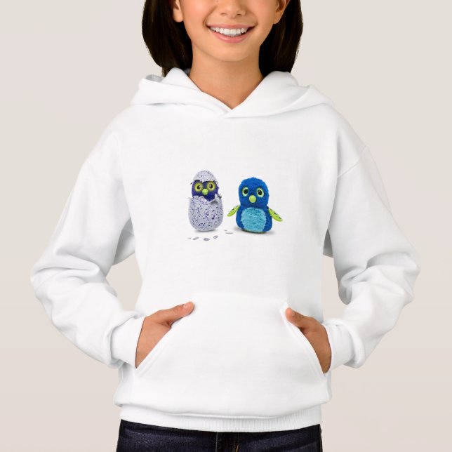 c'est un grand T-shirt pour hatchimals jouet iso (Devant)