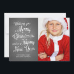 Chalkboard Holiday Photo Christmas Wishes Coral Feiertagskarte<br><div class="desc">Chalkboard holiday cards featuring the words "wishing you a merry christmas and a happy new year", in white, cute and curly calligraphy like typeface, and one photo template of smiling girl dressed like santa claus. The back of these chalkboard Christmas cards feature a festive nautical design, with a coral and...</div>