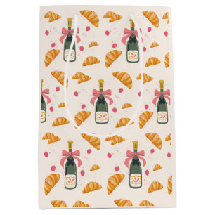 Champagner und Croissants Mittlere Geschenktüte