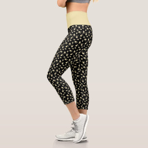 Champagnerherz über schwarz geprägtes Leaf-Muster Capri Leggings