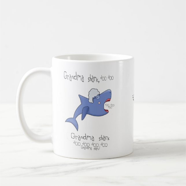 Chanson de requin de bébé, tasse de cadeau de (Gauche)