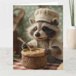 Charmanter und Niedlicher Raccoon-Koch, der eine S Karte
