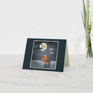 Chat avec une carte d'Halloween en tête Citrouille