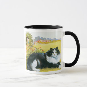 Chat dans sa tasse de cadeau de jardin