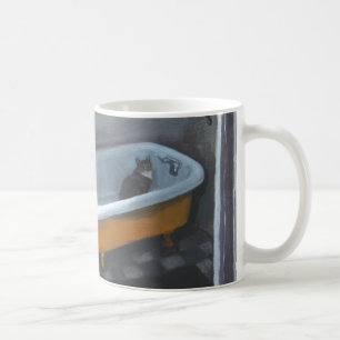 Chat dans une tasse de baquet
