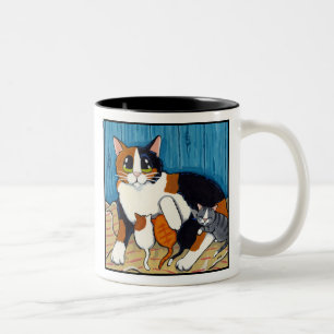 Chat de la maman et tasse de remplacement d'art