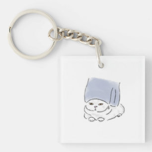 Chat mignon drôle avec serviette et boucle d'oreil