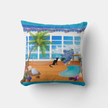 Chat noir et oreiller de plage