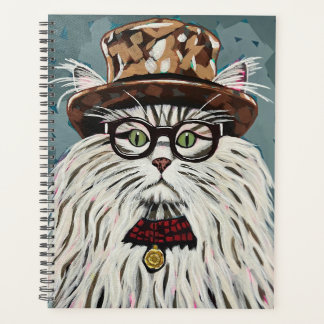 Chat portant casquette et lunettes