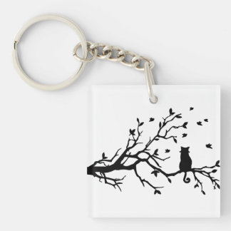 Chat sur un arbre - silhouette