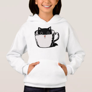 Chaton noir avec nez rouge caché dans une tasse