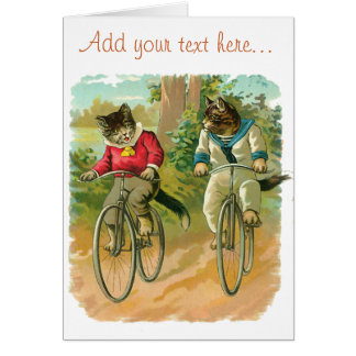 Chats vintages sur la bicyclette