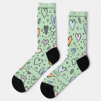 Chaussette Cœurs gribouillés sur fond vert clair avec texte
