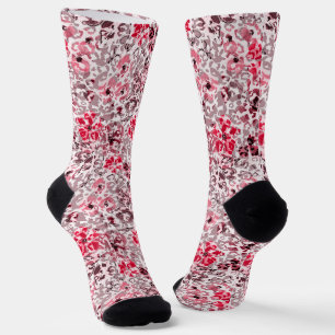 Chaussette Fleurs rouges, roses sur un arrière - plan léopard