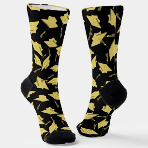 Chaussette Graduation Casquettes noirs et d'or dans l'air