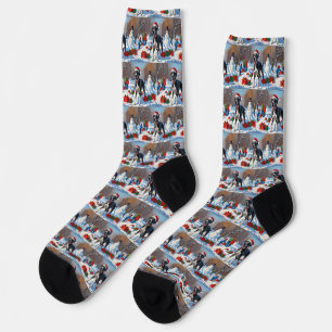 Chaussette Grand Danois courant dans la neige avec un chapeau
