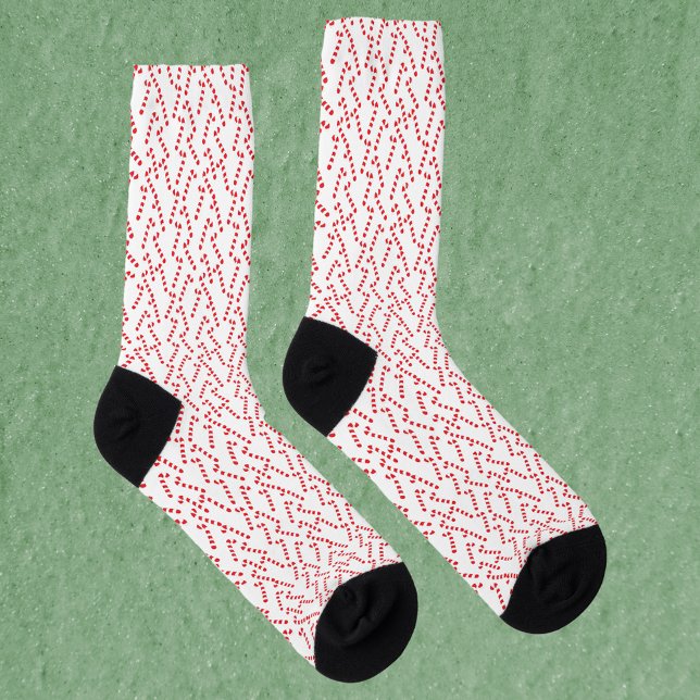 Chaussette Motif sucre de canne rouge et blanc (A pair of socks with a red and white candy cane pattern.)