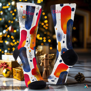Chaussette Noël brillant avec les étoiles rouges, bleues et d